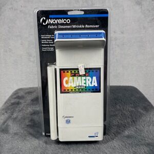 Norelco Fabric Steamer TS60P White Dual Voltage Travel Kit with Bonus Camera